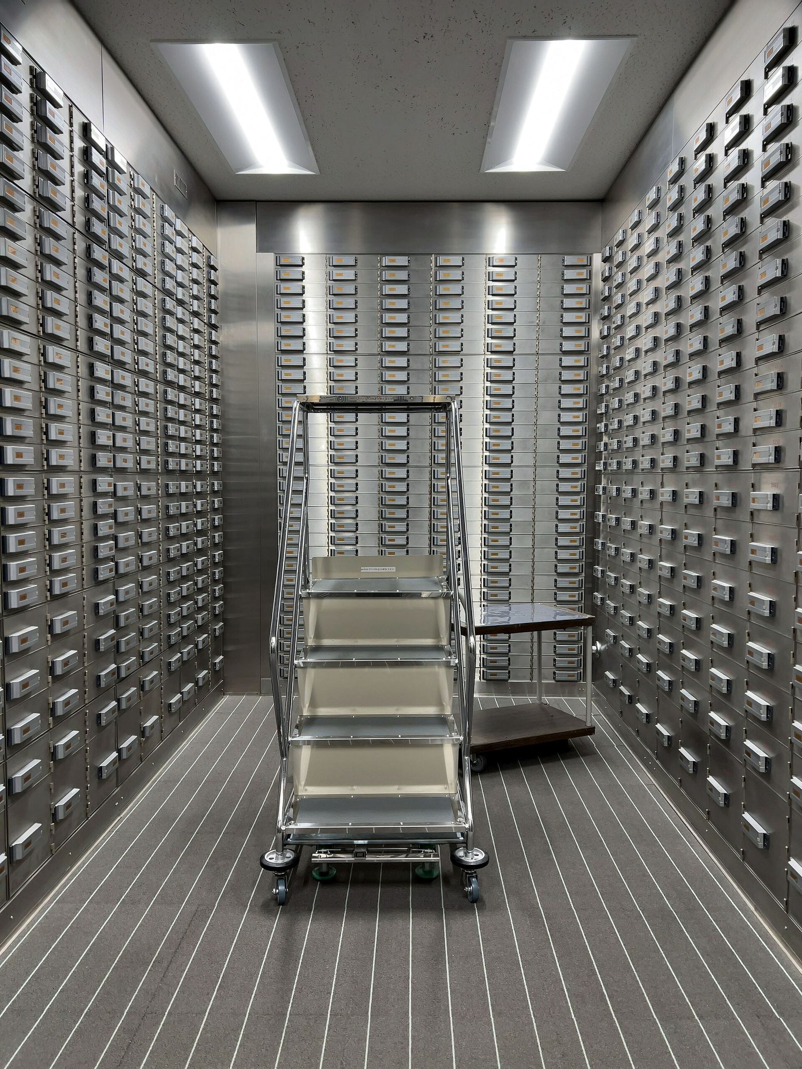 Vault room lined with safe deposit boxes